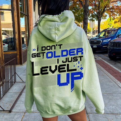 I Don't Older Just Level UP Printed Back Unisex Cotton Hoodie
