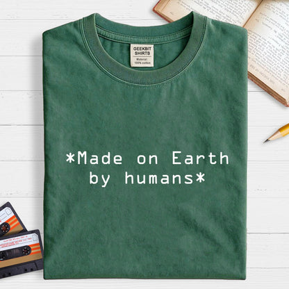 MADE ON EARTH BY HUMANS Geek T-Shirt