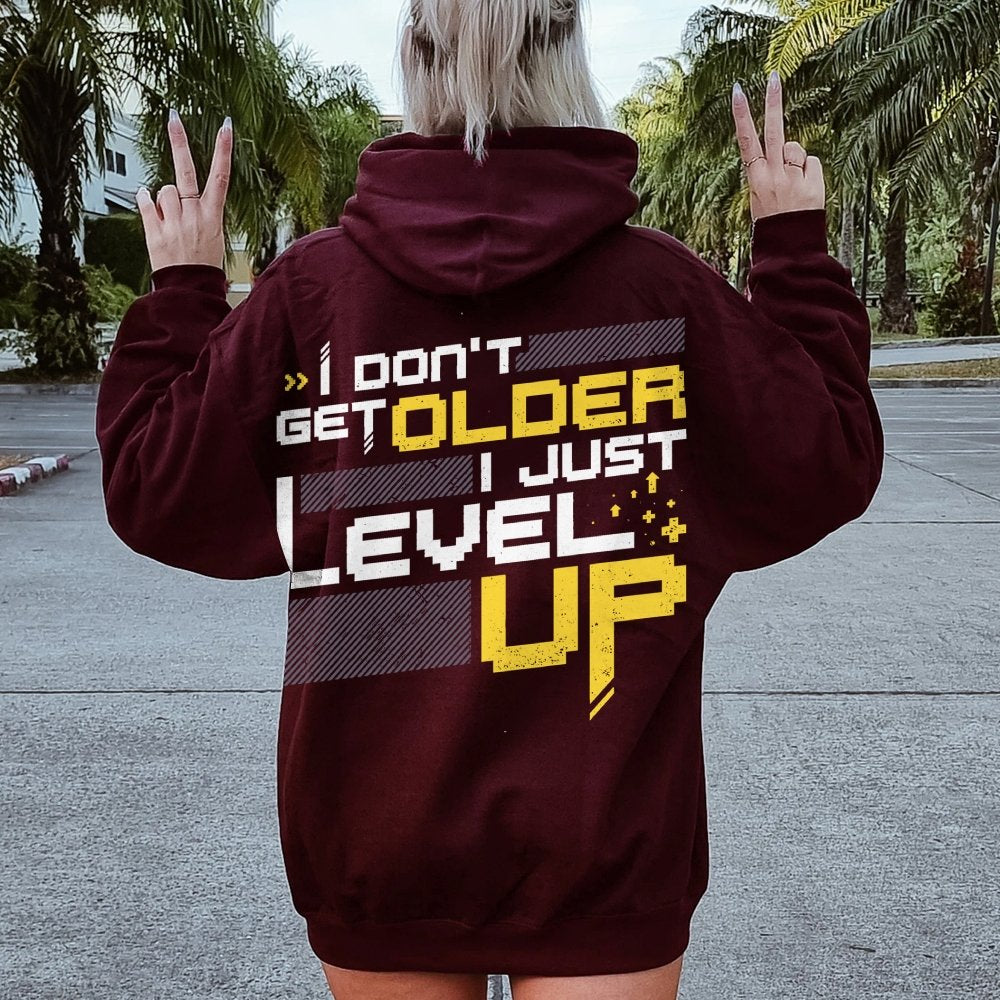 I Don't Older Just Level UP Printed Back Unisex Cotton Hoodie
