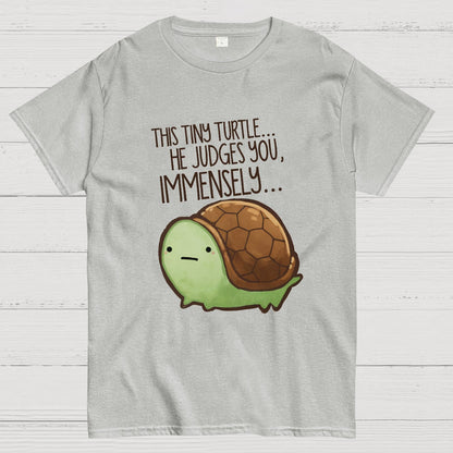 This turtle.. he judges you. Essential Geeky T-Shirt