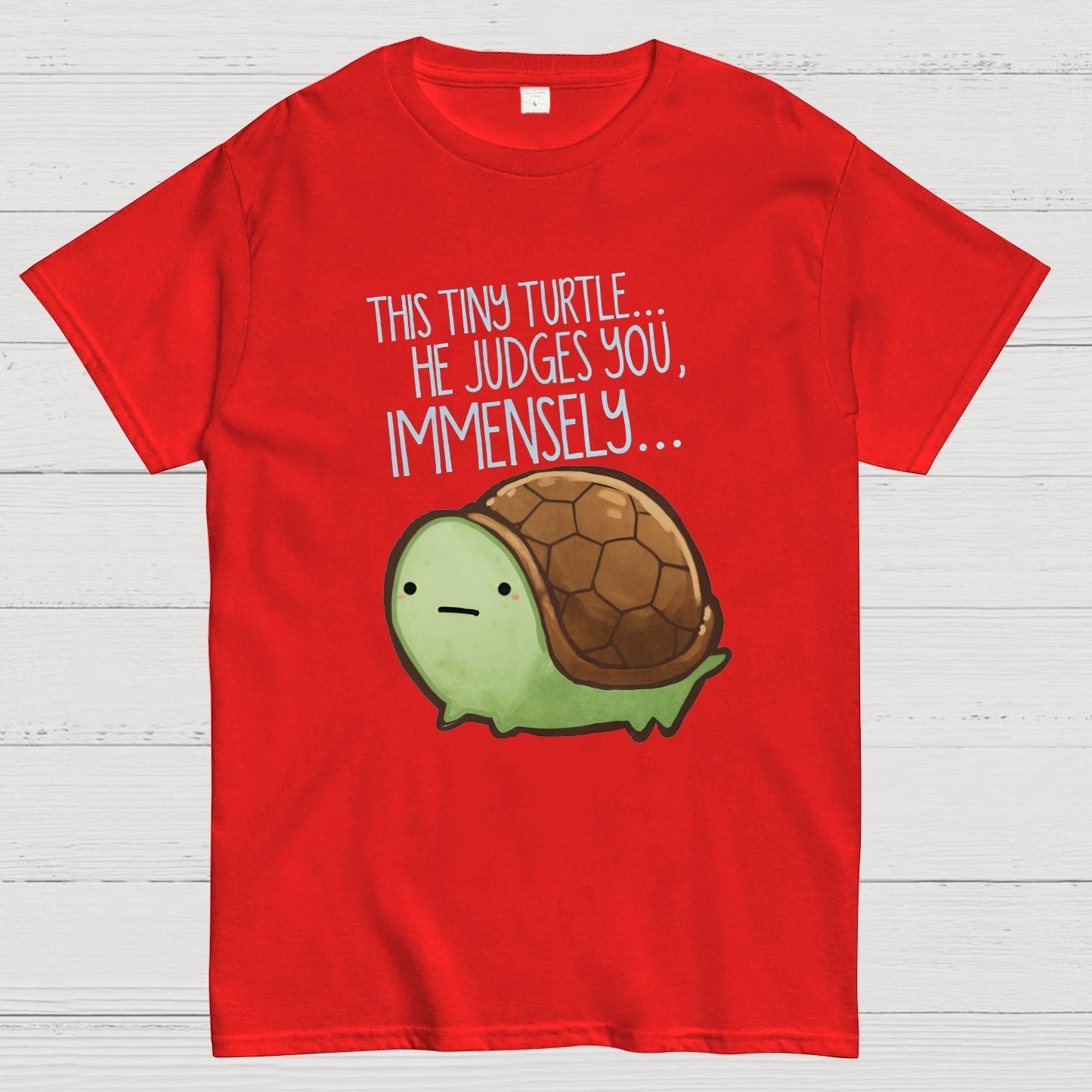 This turtle.. he judges you. Essential Geeky T-Shirt