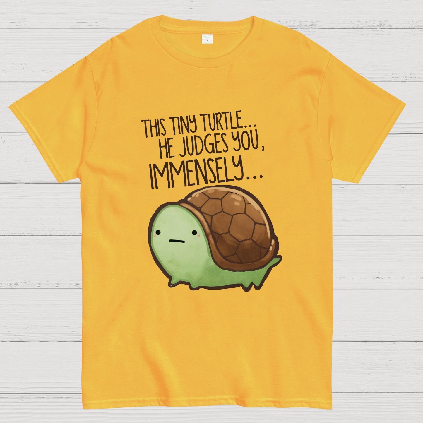 This turtle.. he judges you. Essential Geeky T-Shirt