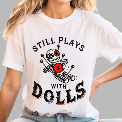 Still Plays With Dolls Geek T-Shirt